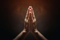 Praying hands with faith in religion and belief in God on dark background. Power of hope or love and devotion. Namaste or Namaskar Royalty Free Stock Photo