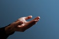 Praying hands with faith in religion and belief in God on dark background. Power of hope or love and devotion. Namaste Royalty Free Stock Photo