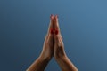 Praying hands with faith in religion and belief in God on dark background. Power of hope or love and devotion. Namaste Royalty Free Stock Photo