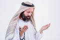 Praying hands of an old arabic man.Indoor picture Royalty Free Stock Photo