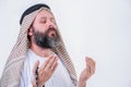 Praying hands of an old arabic man.Indoor picture Royalty Free Stock Photo
