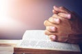..praying hands over a holy bible Royalty Free Stock Photo