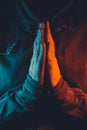 Praying hands of religious person