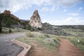 A trail and Praying Hands rock formation in the Garden of the Gods in Colorado Springs. Royalty Free Stock Photo