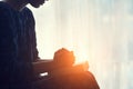 Praying hands, young woman prayer with hands over a Holy Bible Royalty Free Stock Photo