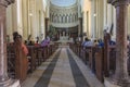 Praying inside Catholic church Royalty Free Stock Photo