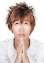 Praying Korean teen portrait Royalty Free Stock Photo