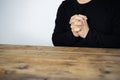Praying man hoping for better. Asking God for good luck, success, forgiveness Royalty Free Stock Photo