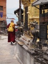 Praying buddhist monk