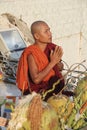 PRAYING MONK