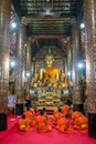 Praying Monks at Wat Xieng Thong luang prabang