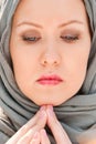 Praying moslem woman close-up portrait Royalty Free Stock Photo