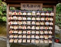 Praying papers in Kinkaku-Ji temple, Kyoto, Japan Royalty Free Stock Photo