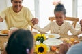 Praying, parents and child holding hands for lunch, dinner or breakfast together with grandparents at home. Family Royalty Free Stock Photo