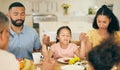 Praying, parents and child at table for lunch, dinner or breakfast together and holding hands for grace. Family Royalty Free Stock Photo