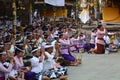 Praying people during a ceremony in Tirta Empul temple. Tampaksiring. Gianyar regency. Bali. Indonesia