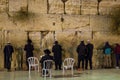 praying people at the western wall in the evening Jerusalem travel