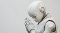 Praying Robot: A Moment of Reflection in Artificial Intelligence Era Royalty Free Stock Photo