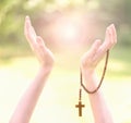 Praying with rosary for a miracle Royalty Free Stock Photo