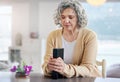 Praying, senior woman and holy book for religion, faith and god help, support and spiritual healing at home. Prayer Royalty Free Stock Photo