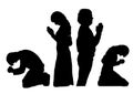 Praying silhouettes Royalty Free Stock Photo