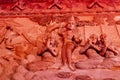 Praying wall figures sculptures Wat Sila Ngu red temple, Thailand