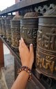 Praying wheels at Buddhist temple Swayambhunath known as Monkey temple. Kathmandu, Nepal Royalty Free Stock Photo