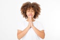 Praying young afro american girl. African woman in summer shirt on white background. Copy space. Mock up. Make a wish. Royalty Free Stock Photo