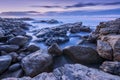 Pre-dawn photograph of misty waves