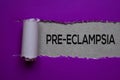 Pre-Eclampsia Text written in torn paper. Medical concept Royalty Free Stock Photo