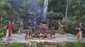 Pre-Hispanic Mayan amerindian people performance into the jungle