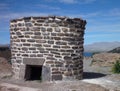 Pre-incan burrial site sillustani with chulpas Royalty Free Stock Photo