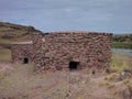 Pre-incan burrial site sillustani with chulpas Royalty Free Stock Photo