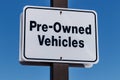 Pre Owned Vehicles sign at a Used Car Dealership I Royalty Free Stock Photo