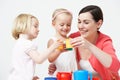 Pre School Children Enjoying Tea Party With Teacher Royalty Free Stock Photo