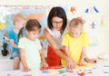 Pre-schoolers in the classroom with a teacher Royalty Free Stock Photo