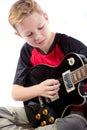 Pre-teen boy and an electric guitar Royalty Free Stock Photo