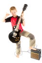 Pre-teen boy and an electric guitar Royalty Free Stock Photo