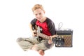 Pre-teen boy and an electric guitar Royalty Free Stock Photo