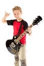 Pre-teen boy and an electric guitar Royalty Free Stock Photo