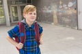 Pre teen boy outside at school lonely Royalty Free Stock Photo