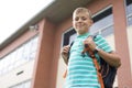 Pre teen boy outside at school Royalty Free Stock Photo