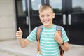 Pre teen boy outside at school Royalty Free Stock Photo