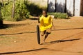 Pre-Teen Boy Playing with Wheel Royalty Free Stock Photo