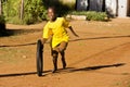 Pre-Teen Boy Playing with Wheel Royalty Free Stock Photo