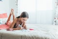 Pre teen girl doing school homework Royalty Free Stock Photo