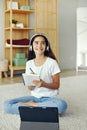 Pre-teen girl using tablet studying online Royalty Free Stock Photo