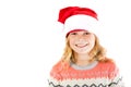 Pre-teen girl wearing a santa hat Royalty Free Stock Photo
