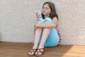 Pre teenager girl texting on mobile phone Royalty Free Stock Photo