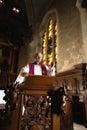 Preaching on a pulpit